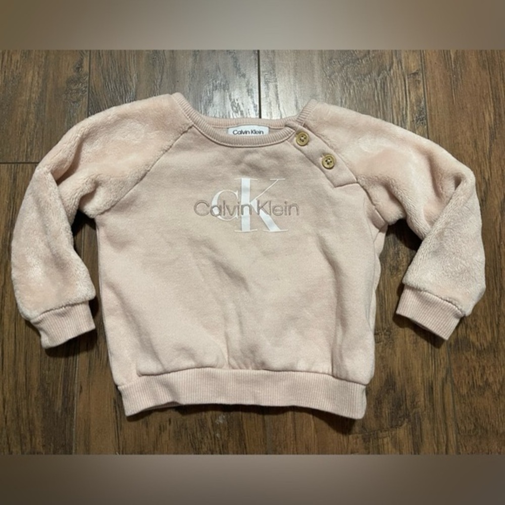 Soft baby pink embroidered Calvin Klein pullover button sweater
